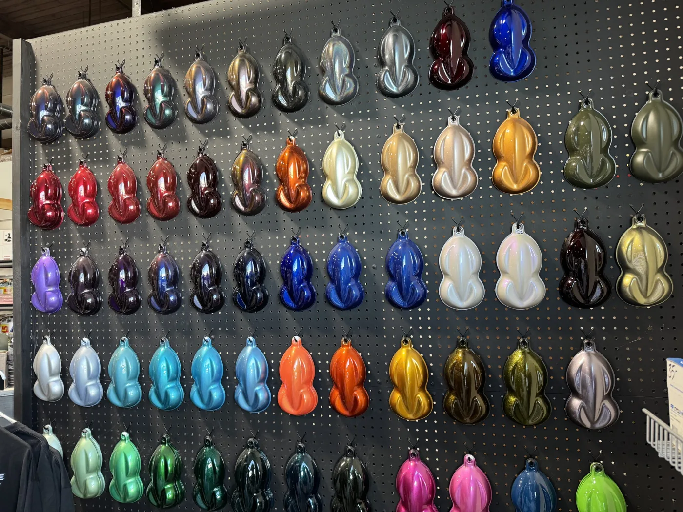Wall of custom mixed paint sample sprayouts
